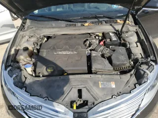 2014 Lincoln MKZ z VIN 3LN6L2JK1ER801584, wystawiony jako Copart lot #49283495 z przebiegiem 93 161 mil mil oraz Szkoda całkowita • Salvage title. Historia ofert i sprzedaży dostępna na DreamBid. Obrazek 11.