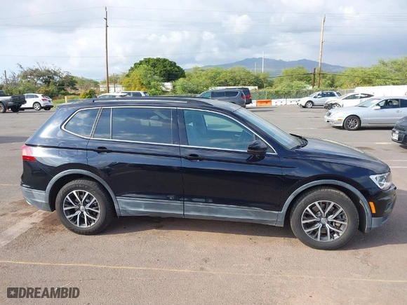 2019 Volkswagen Tiguan SE with VIN 3VV3B7AXXKM012766, listed as a IAAI auction lot 41571347 with 56,594 mi miles. Bid and sale history available at carsss.com. Image 13.