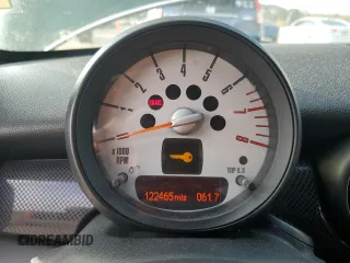 2013 MINI Coupe S z VIN WMWSX3C51DT409008, wystawiony jako Copart lot #82781914 z przebiegiem 122 465 mil mil oraz Tytuł czysty. Historia ofert i sprzedaży dostępna na DreamBid. Obrazek 9.