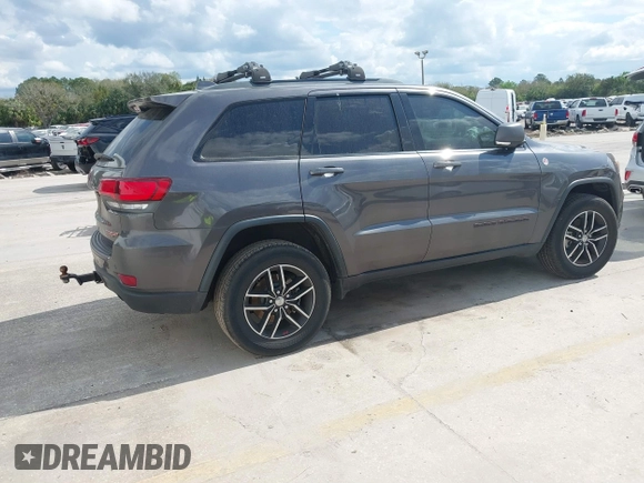 2018 Jeep Grand Cherokee Trailhawk with VIN 1C4RJFLG8JC427345, listed as a IAAI auction lot 41557222 with 49,469 mi miles and . Bid and sale history available at DreamBid. Image 4.