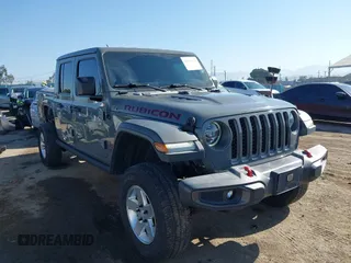 2020 Jeep Gladiator Rubicon with VIN 1C6JJTBG6LL149469, listed as a IAAI auction lot 42224826 with 58,870 mi miles and . Bid and sale history available at DreamBid. Image 1.