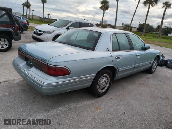 1996 Mercury Grand Marquis GS with VIN 2MELM74W5TX653873, listed as a Copart auction lot 74659254 with 86,589 mi miles and Salvage Title. Bid and sale history available at DreamBid. Image 3.