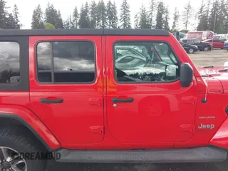 2018 Jeep Wrangler Unlimited Sahara with VIN 1C4HJXEG1JW310817, listed as a IAAI auction lot 42248374 with 64,516 mi miles and . Bid and sale history available at DreamBid. Image 14.