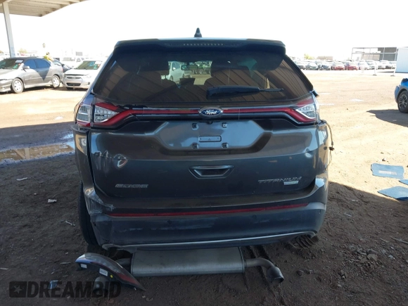 2015 Ford Edge Titanium z VIN 2FMTK3K90FBC12582, wystawiony jako IAAI lot #41860973 z przebiegiem Nie podano mil oraz . Historia ofert i sprzedaży dostępna na DreamBid. Obrazek 6.