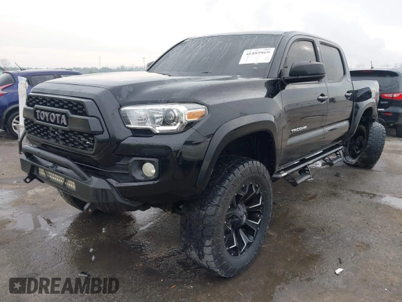 2017 Toyota Tacoma SR5 with VIN 5TFCZ5AN6HX076769, listed as a IAAI auction lot 41889869 with 208,894 mi miles. Bid and sale history available at carsss.com. Image 2.