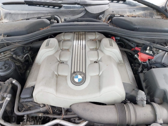 2005 BMW 5 Series 545i with VIN WBANB33555CN64724, listed as a IAAI auction lot 41715011 with 152,043 mi miles and . Bid and sale history available at carsss.com. Image 10.
