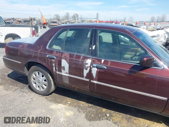 2003 Mercury Grand Marquis LS Premium z VIN 2MEFM75W73X650193, wystawiony jako IAAI lot #41803310 z przebiegiem 151 719 mil mil oraz . Historia ofert i sprzedaży dostępna na DreamBid. Obrazek 6.