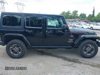 2016 Jeep Wrangler Unlimited Sahara z VIN 1C4HJWEG3GL343340, wystawiony jako IAAI lot #42683859 z przebiegiem 92 878 mil mil oraz . Historia ofert i sprzedaży dostępna na DreamBid. Obrazek 14.