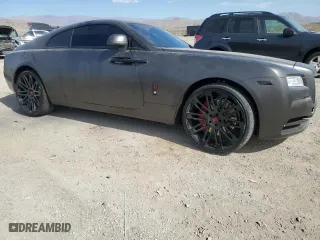 2014 Rolls-Royce Wraith with VIN SCA665C57EUX84259, listed as a Copart auction lot 65586204 with 52,048 mi miles and Salvage Title. Bid and sale history available at carsss.com. Image 4.