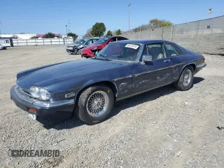 1989 Jaguar XJS z VIN SAJNA5849KC156564, wystawiony jako Copart lot #49372475 z przebiegiem 102 634 mil mil oraz Szkody całkowita. Historia ofert i sprzedaży dostępna na DreamBid. Obrazek 1.