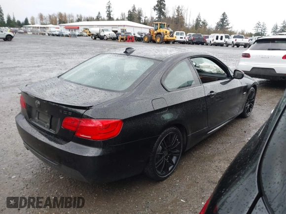 2011 BMW 3 Series 328i xDrive with VIN WBAKF5C59BE654865, listed as a IAAI auction lot 40848193 with 114,490 mi miles. Bid and sale history available at carsss.com. Image 4.