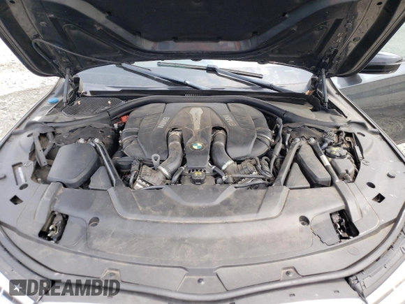 2016 BMW 7 Series 750i xDrive with VIN WBA7F2C5XGG418225, listed as a Copart auction lot 54860623 with 76,980 mi miles and . Bid and sale history available at DreamBid. Image 11.