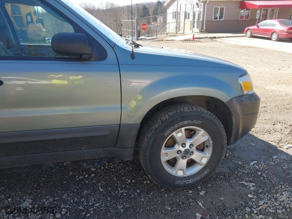 2006 Ford Escape XLT with VIN 1FMYU93166KA88481, listed as a IAAI auction lot 41717872 with 155,539 mi miles. Bid and sale history available at carsss.com. Image 12.