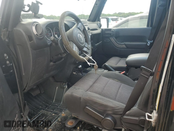 2012 Jeep Wrangler Unlimited Sport z VIN 1C4BJWDG3CL181596, wystawiony jako Copart lot #57940655 z przebiegiem 168 882 mil mil oraz Czysty tytuł • Clean title. Historia ofert i sprzedaży dostępna na DreamBid. Obrazek 7.