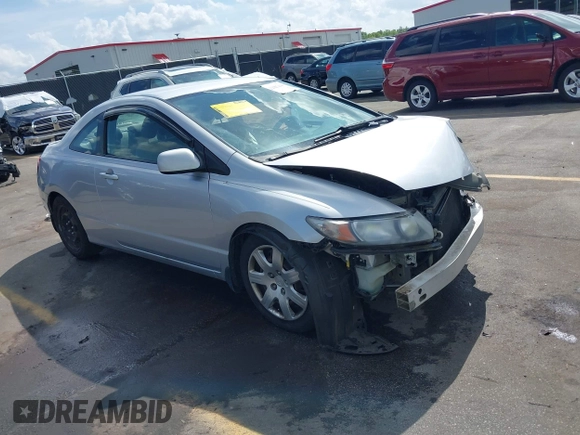 2010 Honda Civic Cpe LX with VIN 2HGFG1B68AH530485, listed as a IAAI auction lot 41907809 with 275,653 mi miles. Bid and sale history available at carsss.com. Image 1.