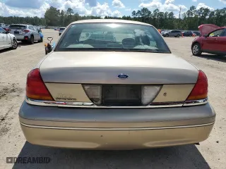 2000 Ford Crown Victoria with VIN 2FAFP73W0YX127395, listed as a Copart auction lot 72442494 with 123,999 mi miles and Salvage Title. Bid and sale history available at carsss.com. Image 6.