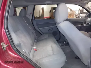 2007 Jeep Grand Cherokee Laredo with VIN 1J8GR48K97C631672, listed as a IAAI auction lot 41520054 with 231,576 mi miles. Bid and sale history available at carsss.com. Image 8.