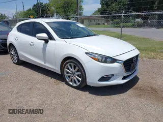 2017 Mazda 3 Touring with VIN 3MZBN1L77HM157118, listed as a IAAI auction lot 42765099 with 132,485 mi miles and . Bid and sale history available at DreamBid. Image 1.