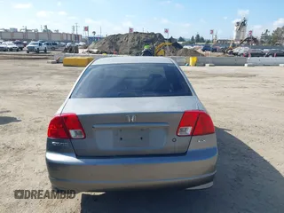 2004 Honda Civic LX with VIN 2HGES16654H579927, listed as a IAAI auction lot 41911814 with 233,803 mi miles. Bid and sale history available at carsss.com. Image 16.