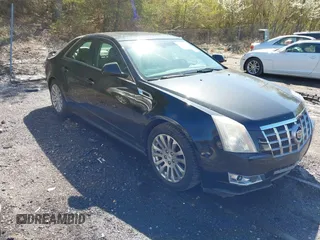 2012 Cadillac CTS Premium z VIN 1G6DP5E3XC0131943, wystawiony jako IAAI lot #41747969 z przebiegiem 70 859 mil mil oraz . Historia ofert i sprzedaży dostępna na DreamBid. Obrazek 1.