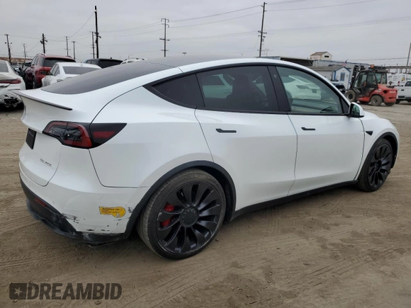 2022 Tesla Model Y Performance with VIN 7SAYGDEF1NF410241, listed as a Copart auction lot 55359505 with 42,652 mi miles and Salvage Title. Bid and sale history available at DreamBid. Image 3.