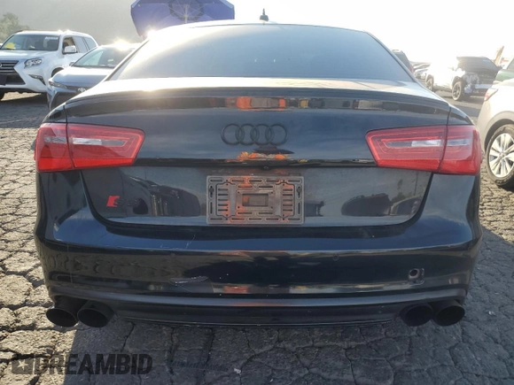 2013 Audi S6 Prestige z VIN WAUJ2AFC7DN143877, wystawiony jako Copart lot #80368324 z przebiegiem Nie podano mil oraz Szkody całkowita. Historia ofert i sprzedaży dostępna na DreamBid. Obrazek 6.