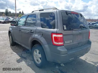 2010 Ford Escape XLT with VIN 1FMCU0D76AKA33885, listed as a IAAI auction lot 41837102 with 140,193 mi miles. Bid and sale history available at carsss.com. Image 3.