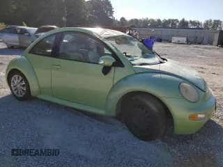 2005 Volkswagen New Beetle Coupe GL with VIN 3VWBK31C35M400925, listed as a Copart auction lot 72513484 with 199,597 mi miles and Salvage Title. Bid and sale history available at carsss.com. Image 4.