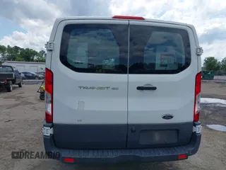 2016 Ford Transit Cargo z VIN 1FTYE1ZM9GKB14741, wystawiony jako IAAI lot #42165906 z przebiegiem 162 976 mil mil oraz . Historia ofert i sprzedaży dostępna na DreamBid. Obrazek 16.