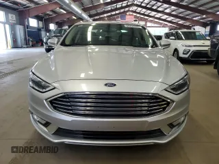 2017 Ford Fusion Hybrid Titanium z VIN 3FA6P0RU1HR300370, wystawiony jako Copart lot #65206605 z przebiegiem 150 424 mil mil oraz Czysty tytuł • Clean title. Historia ofert i sprzedaży dostępna na DreamBid. Obrazek 5.
