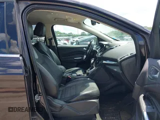 2013 Ford Escape Titanium with VIN 1FMCU9J90DUA01551, listed as a IAAI auction lot 42686247 with 190,707 mi miles and . Bid and sale history available at DreamBid. Image 5.