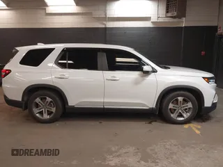 2023 Honda Pilot EX-L z VIN 5FNYG1H5XPB043275, wystawiony jako IAAI lot #41747522 z przebiegiem 18 865 mil mil oraz . Historia ofert i sprzedaży dostępna na DreamBid. Obrazek 13.