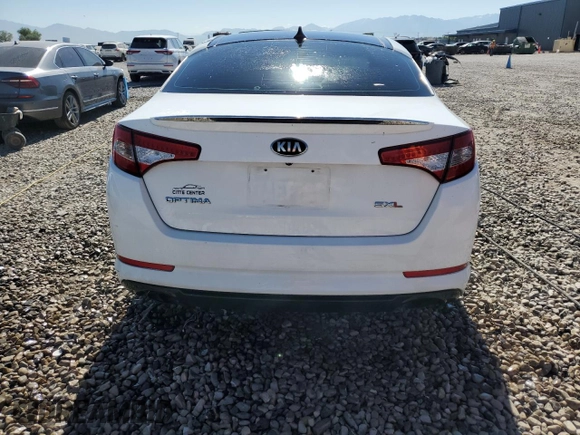 2013 Kia Optima SX with VIN 5XXGR4A60DG213906, listed as a Copart auction lot 60121165 with 121,559 mi miles and Salvage title. Bid and sale history available at DreamBid. Image 6.