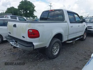 2001 Ford F-150 XLT with VIN 1FTRW08L81KD86516, listed as a IAAI auction lot 42689615 with 320,437 mi miles and . Bid and sale history available at DreamBid. Image 4.