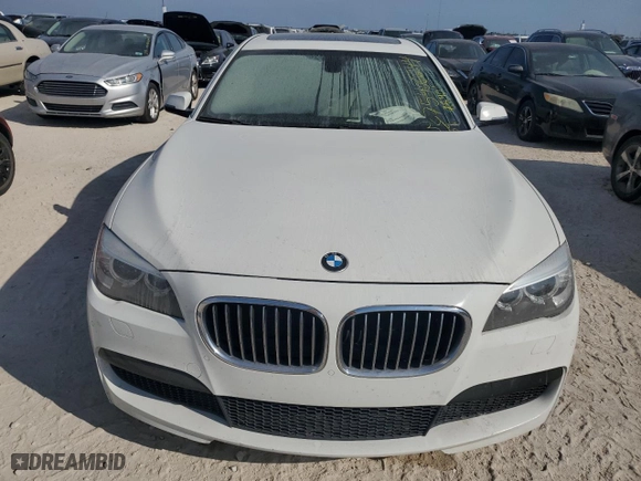 2013 BMW 7 Series 740Li with VIN WBAYE4C57DD137483, listed as a Copart auction lot 75406244 with 0 mi miles and Salvage Title. Bid and sale history available at carsss.com. Image 5.
