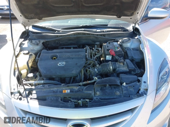 2009 Mazda 6 i Touring with VIN 1YVHP82A795M31562, listed as a IAAI auction lot 41970484 with 128,724 mi miles and . Bid and sale history available at carsss.com. Image 10.