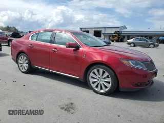2013 Lincoln MKS EcoBoost with VIN 1LNHL9FT1DG609011, listed as a Copart auction lot 55793575 with Not provided miles and Salvage title. Bid and sale history available at DreamBid. Image 4.