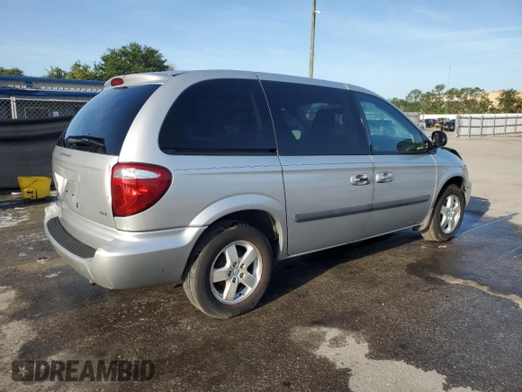2005 Dodge Caravan SXT with VIN 1D4GP45R95B419486, listed as a Copart auction lot 60313045 with 180,615 mi miles and Salvage title. Bid and sale history available at DreamBid. Image 3.