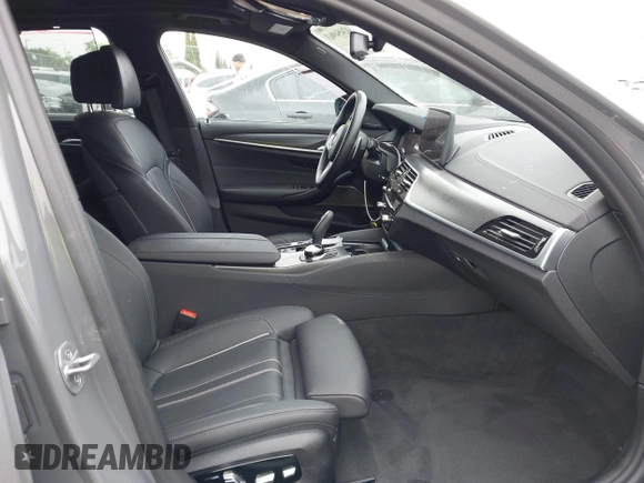 2022 BMW 5 Series M550i xDrive with VIN WBA13BK07NCL07995, listed as a IAAI auction lot 42454963 with 12,721 mi miles and . Bid and sale history available at DreamBid. Image 5.