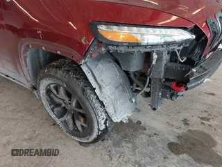 2016 Jeep Cherokee Trailhawk with VIN 1C4PJMBBXGW135138, listed as a IAAI auction lot 41595718 with 267,058 mi miles and . Bid and sale history available at DreamBid. Image 17.