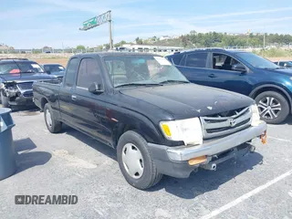 1999 Toyota Tacoma with VIN 4TAVL52N2XZ488050, listed as a IAAI auction lot 41428488 with 407,107 mi miles and . Bid and sale history available at DreamBid. Image 1.
