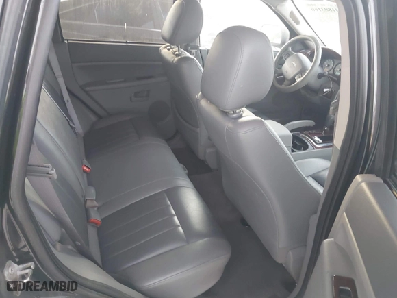 2005 Jeep Grand Cherokee Laredo with VIN 1J4HR48N75C647740, listed as a IAAI auction lot 41803160 with 145,147 mi miles. Bid and sale history available at carsss.com. Image 8.
