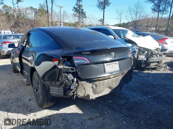 2022 Tesla Model 3 with VIN 5YJ3E1EA9NF147836, listed as a IAAI auction lot 41363603 with 28,748 mi miles. Bid and sale history available at carsss.com. Image 6.