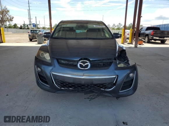 2011 Mazda CX-7 S Grand Touring z VIN JM3ER4D33B0355181, wystawiony jako Copart lot #69687474 z przebiegiem 223 622 mil mil oraz Nie do naprawy • Non repairable. Historia ofert i sprzedaży dostępna na DreamBid. Obrazek 5.