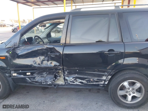 2006 Honda Pilot EX-L with RES with VIN 5FNYF28616B029670, listed as a IAAI auction lot 41425494 with 206,756 mi miles. Bid and sale history available at carsss.com. Image 14.
