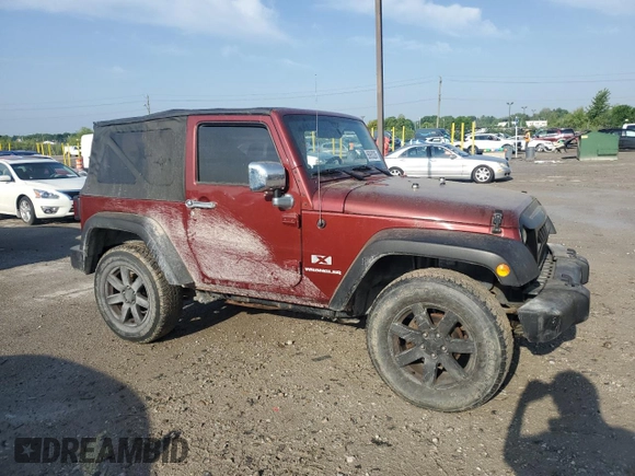2009 Jeep Wrangler X with VIN 1J4FA24119L756089, listed as a Copart auction lot 56953205 with 158,157 mi miles and Salvage title. Bid and sale history available at DreamBid. Image 4.