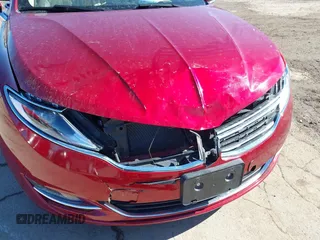 2015 Lincoln MKZ Hybrid with VIN 3LN6L2LUXFR606101, listed as a IAAI auction lot 41668806 with 77,112 mi miles. Bid and sale history available at carsss.com. Image 6.