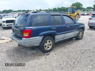 2000 Jeep Grand Cherokee Laredo z VIN 1J4GW48S9YC338947, wystawiony jako IAAI lot #42545830 z przebiegiem 234 251 mil mil oraz . Historia ofert i sprzedaży dostępna na DreamBid. Obrazek 4.
