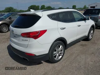 2013 Hyundai Santa Fe Sport z VIN 5XYZU3LA5DG045646, wystawiony jako IAAI lot #42380560 z przebiegiem 131 944 mil mil oraz . Historia ofert i sprzedaży dostępna na DreamBid. Obrazek 4.