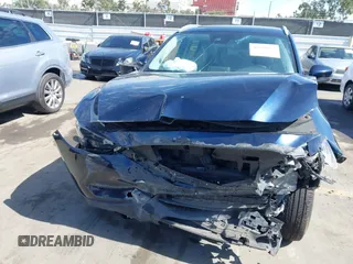 2020 Mazda CX-5 Grand Touring with VIN JM3KFADM6L1830093, listed as a IAAI auction lot 41699672 with 66,769 mi miles. Bid and sale history available at carsss.com. Image 6.